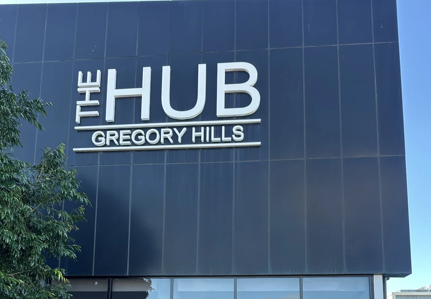 The Hub Gregory Hills building signage, where APEX. Chiro is located